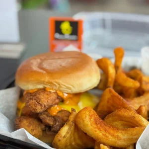 A fresh variety of Mo’s Chicken and Waffles menu items including jumbo wings, hand-breaded tenders, and spicy Zinger wraps in Simsbury.